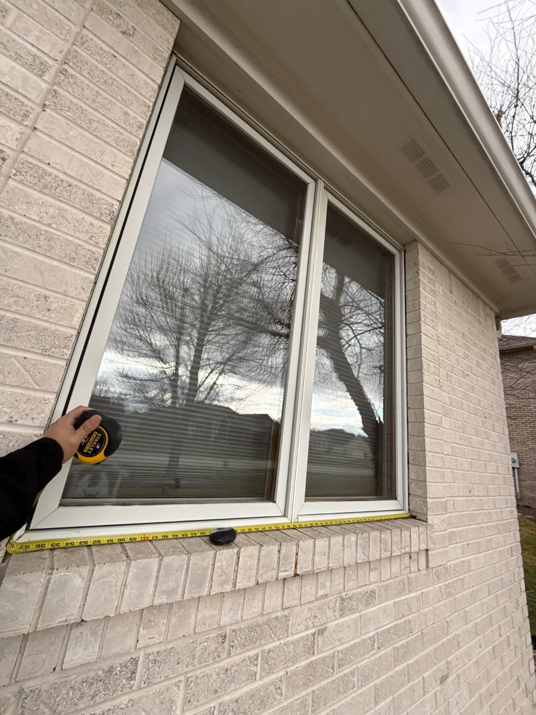 Window replacement documented in Whiteland